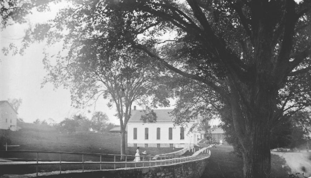 The walkway and retaining wall built between the Dewing mansion and the church