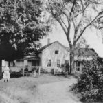 The George Clark homestead in 1912. The young girl in the photograph is Mae Clark.